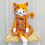 Poupée orange robe vintage