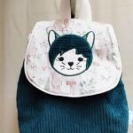 Sac à dos vert et ours