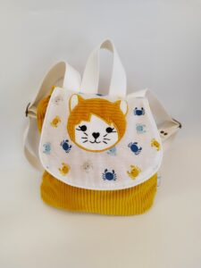 sac à dos velours côtelé moutarde et crabes